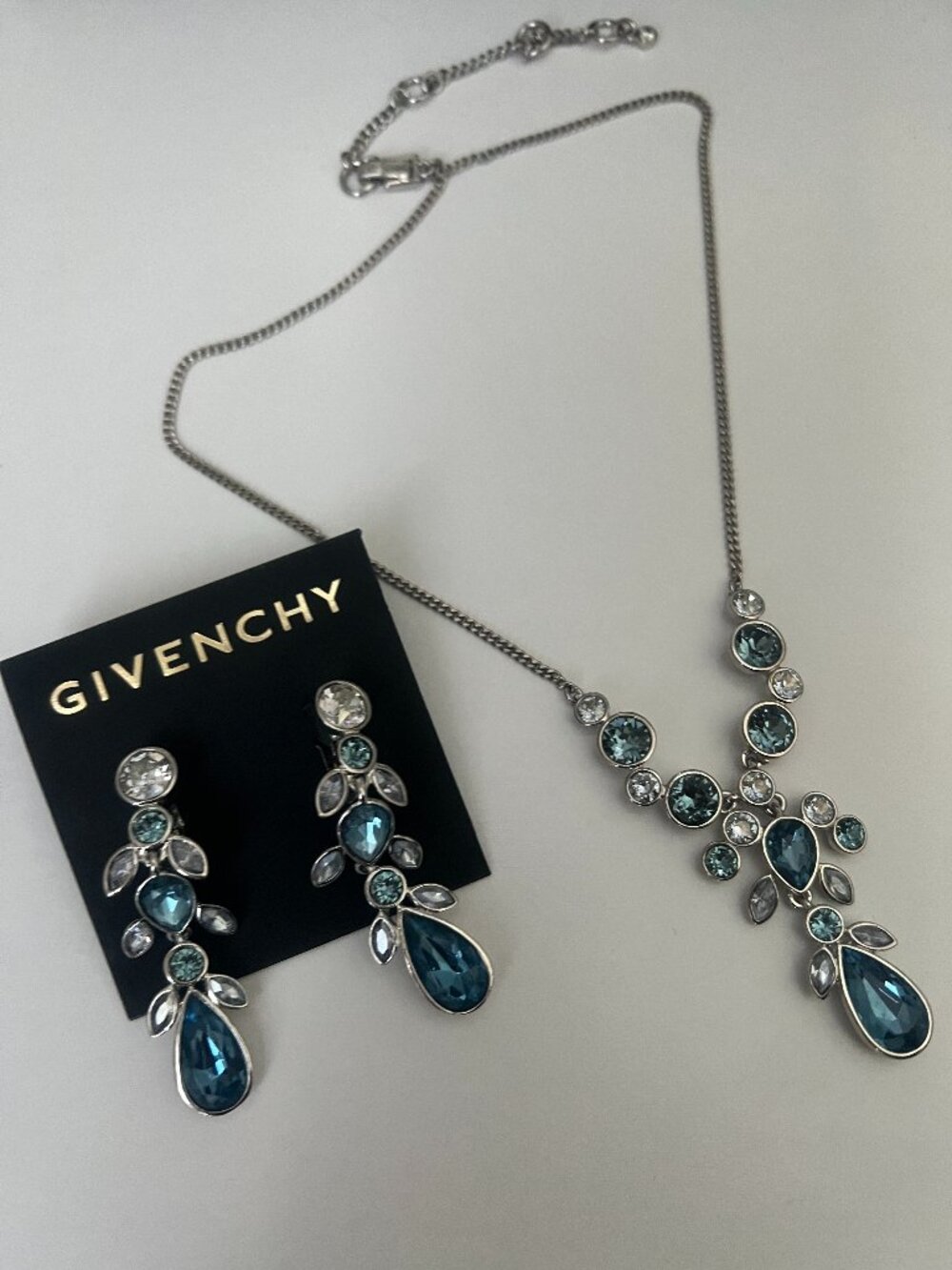 New Givenchy Blue Topaz and Clear Crystal Y 16" Necklace and Drop Earrings Set.